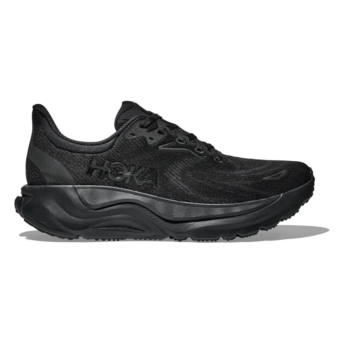 Black Hoka running shoe on a white background