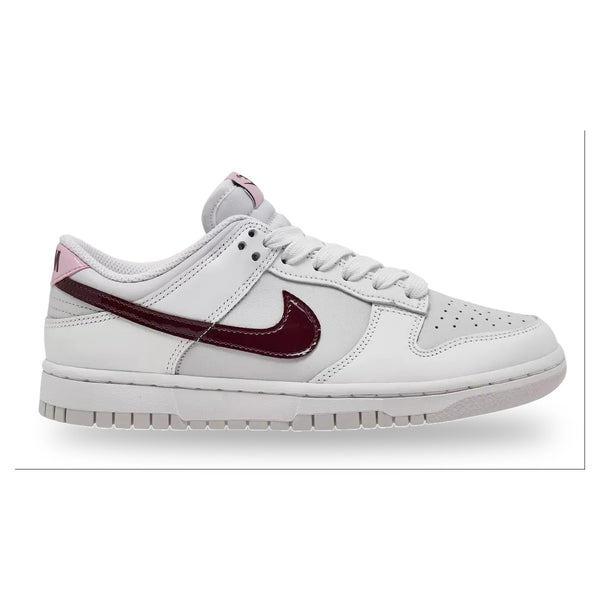 White sneaker with a maroon swoosh logo on a white background