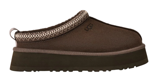Brown slipper with decorative trim on a white background