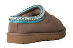 Brown UGG slipper with a blue and white trim on a white background - Image 4