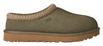Green slip-on shoe with brown sole on a white background - Image 1