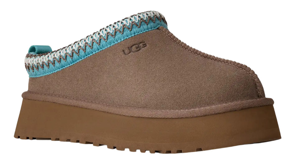 Brown UGG slipper with blue and gray trim on a white background