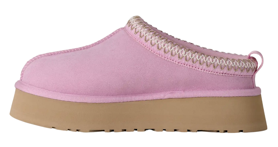 Pink slip-on shoe with a beige sole on a white background