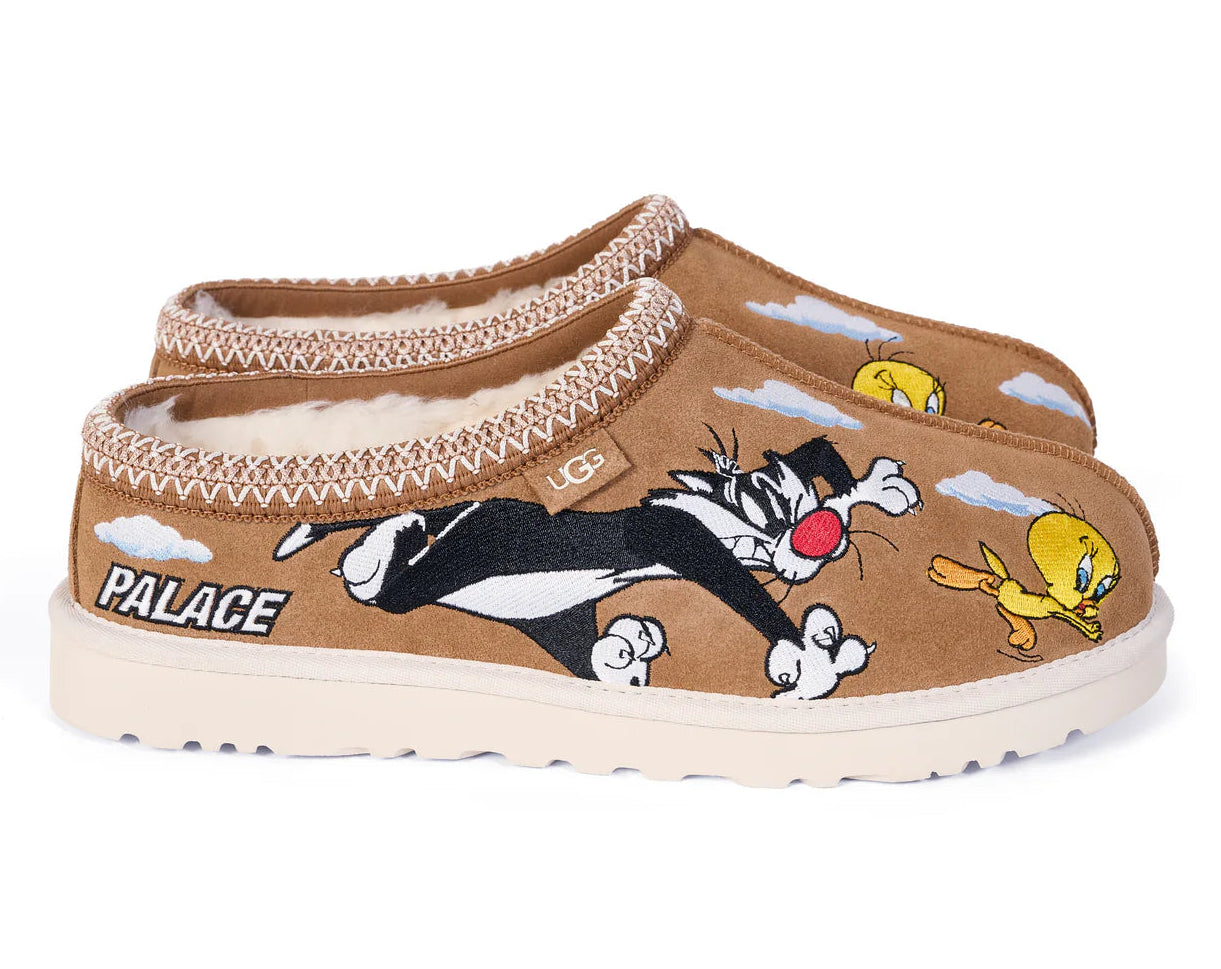 Brown slippers with cartoon characters and 'Palace' branding on a white background
