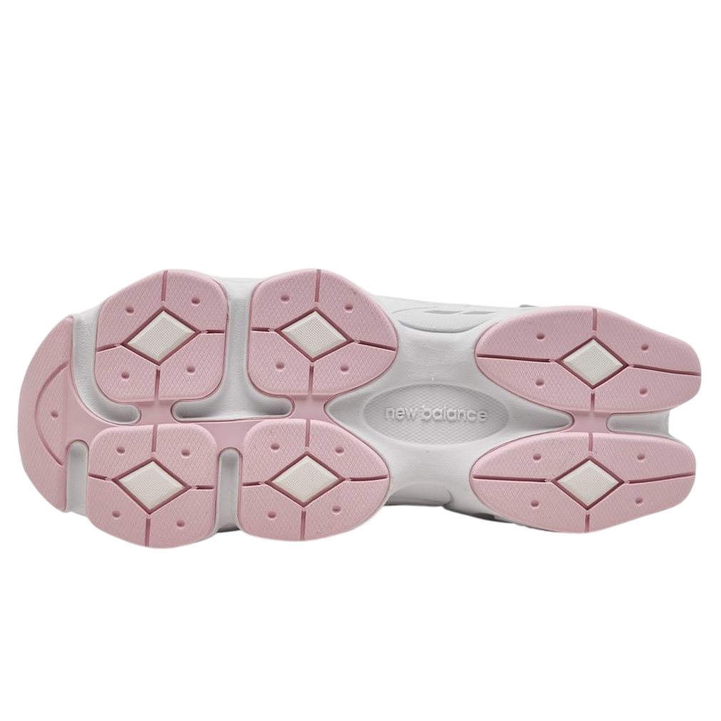 Pink and white shoe sole with 'New Balance' branding on a white background