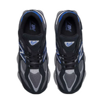 Pair of black and gray running shoes with blue accents on a white background - Image 4