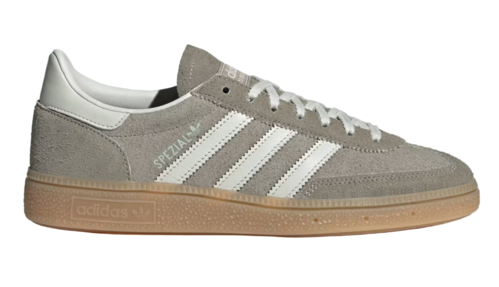 Gray Adidas sneaker with white stripes on a light gray background