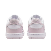 Pair of pink sneakers on a white background
