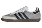 White Adidas sneaker with black stripes on a white background - Image 3