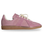 Pink sneaker with a brown sole on a white background - Image 1