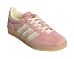 Pink Adidas sneaker with white laces on a light gray background - Image 2