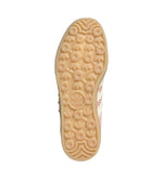 Close-up of a shoe sole with a brand logo on a light gray background - Image 5