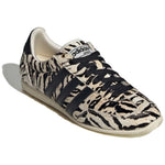 Sneaker with zebra pattern on a white background - Image 4