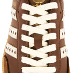 Brown Adidas sneaker with white laces on a white background - Image 4