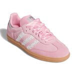 Pink Adidas sneaker with white stripes on a white background - Image 2