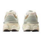 Pair of light gray sneakers with New Balance logo on a white background - Image 5