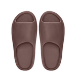 Pair of brown slippers on a white background - Image 2