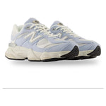 Light blue sneakers with white laces on a white background - Image 2