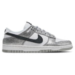 Silver glittery sneaker with black swoosh logo on a white background - Image 1