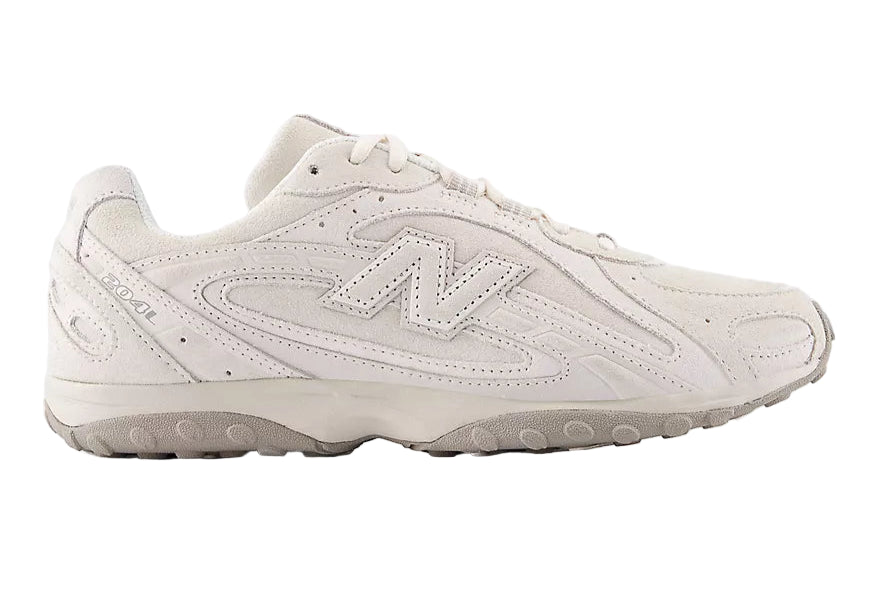 White sneaker with New Balance logo on a white background