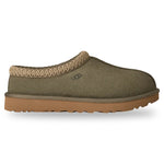 Green slip-on shoe with brown sole on a white background - Image 1